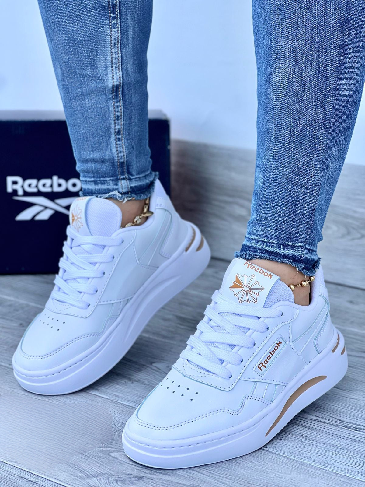 REEBOK COSIDO